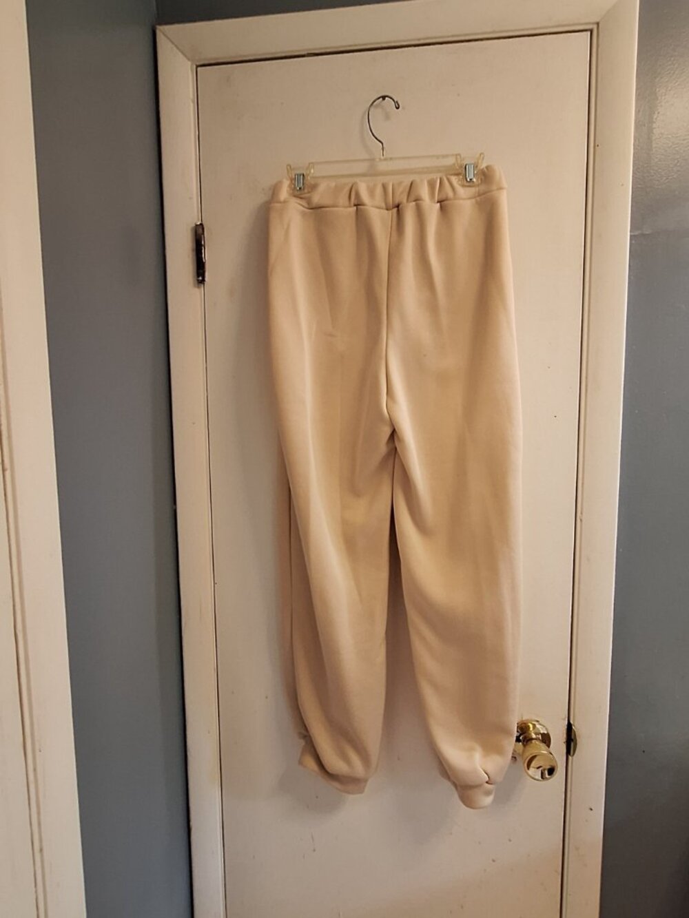 tan/light brown jogging pants medium